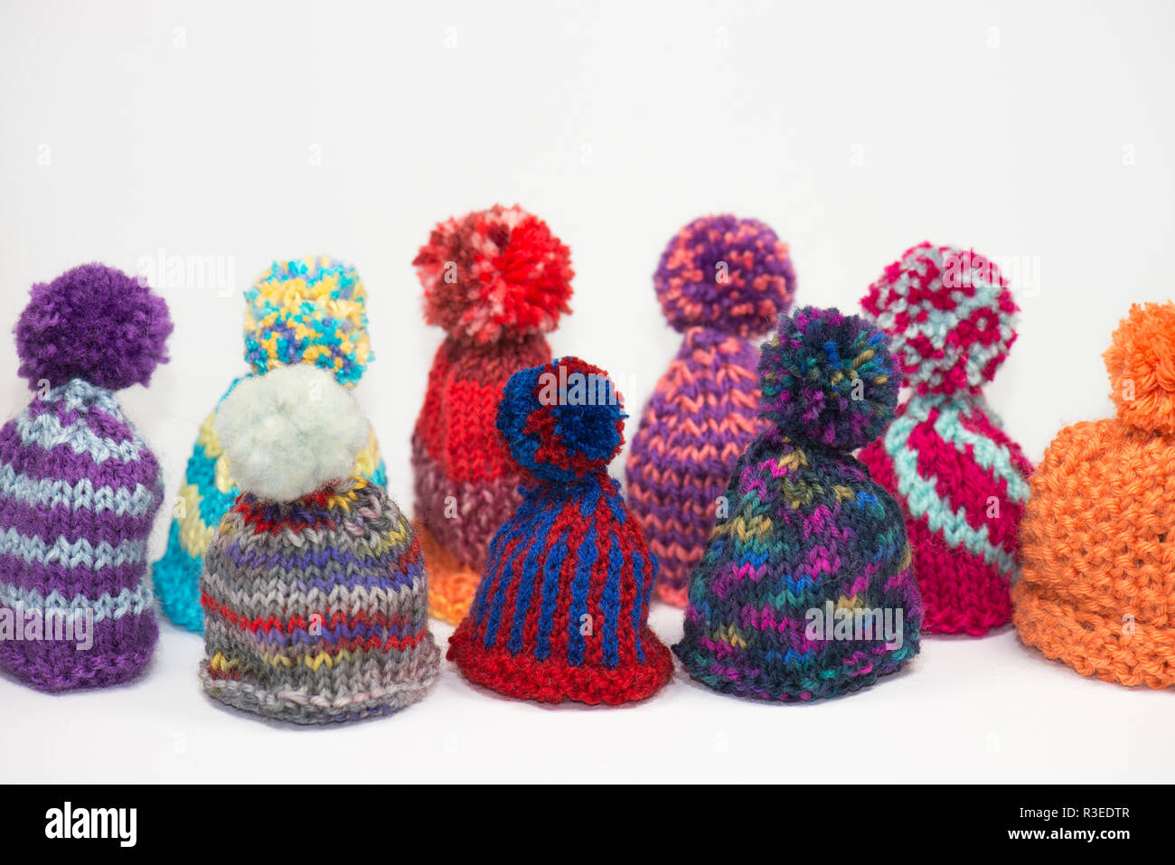 knitted bobble hats Stock Photo