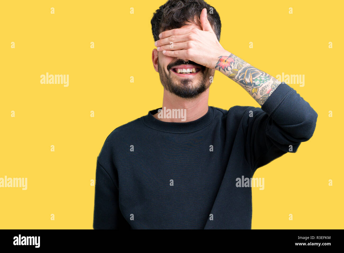 Young handsome man over isolated background smiling and laughing with ...
