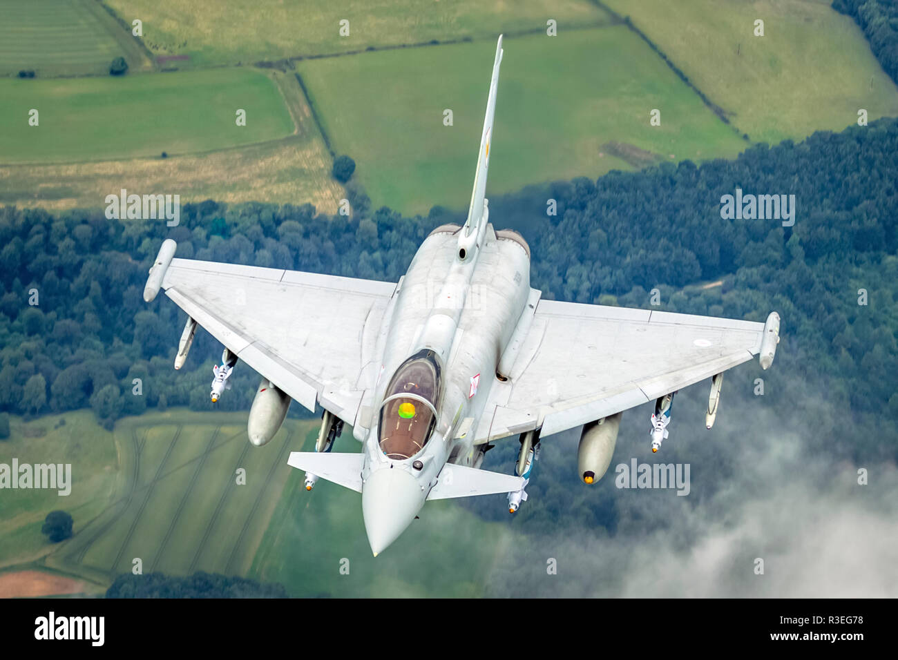 Royal Air force (RAF) Eurofighter Typhoon in flight. A twin-engine, canard-delta wing, multirole fighter. Photographed at Royal International Air Tatt Stock Photo