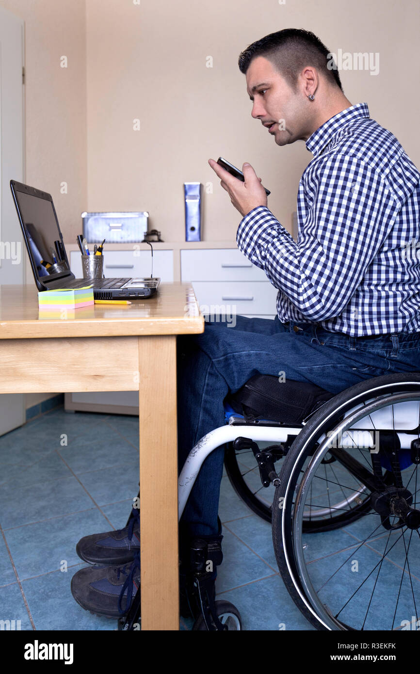 wheelchairs done office work Stock Photo Alamy