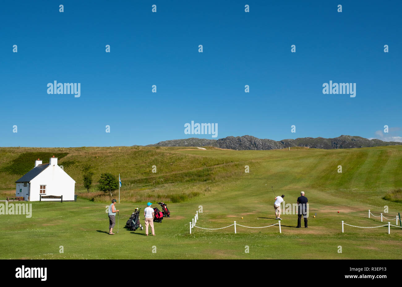 Golfers playing at Traigh golf course,Arisaig, Scotland. Stock Photo