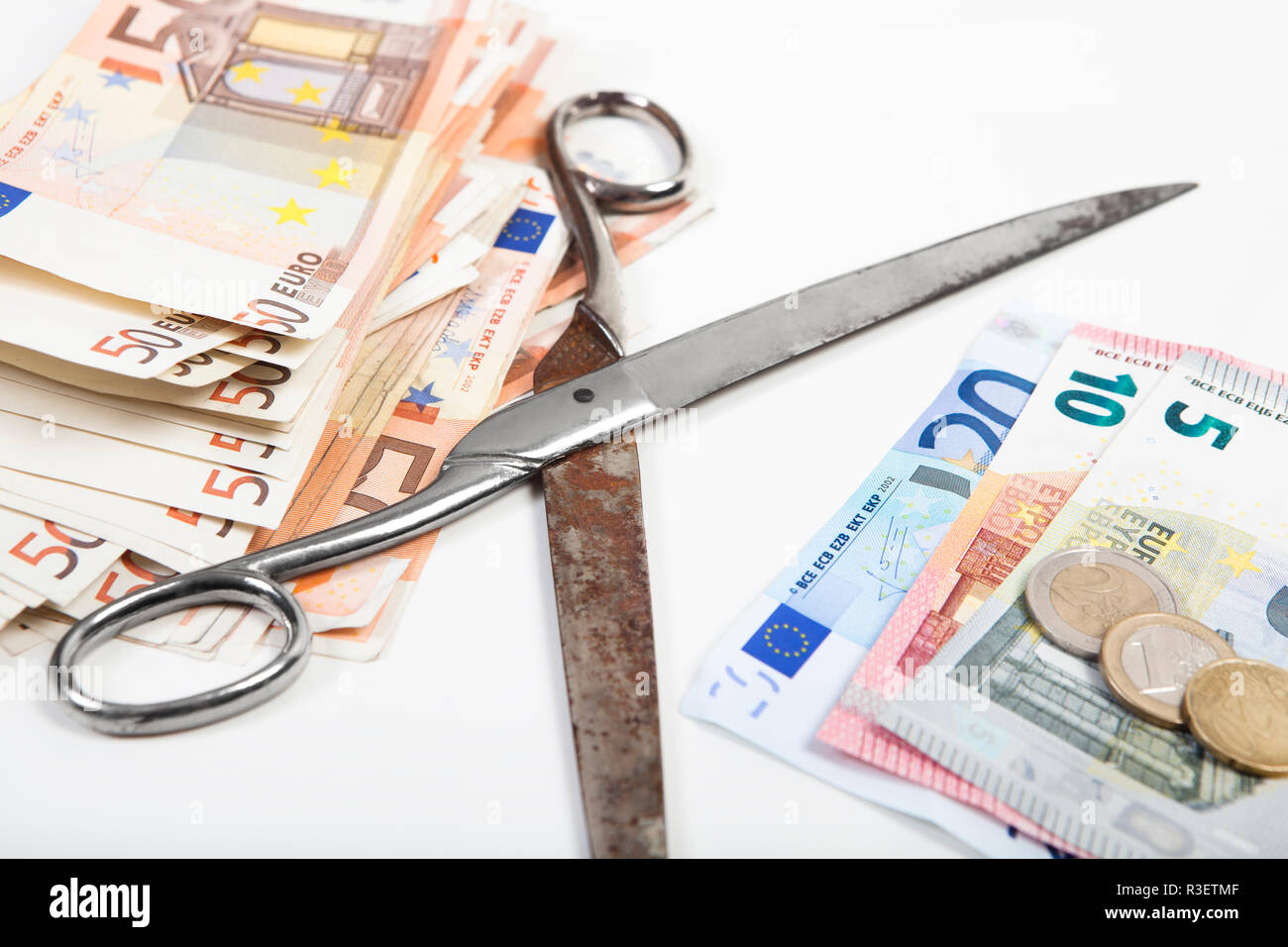 money scissors diverges Stock Photo Alamy