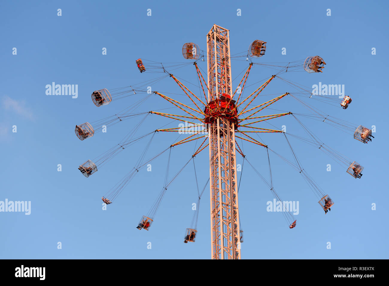 Around the World XXL flying swing ride at Jubilee Gardens South Bank  London. Thrill ride. Fairground ride with people in chairs hanging from  rotating Stock Photo - Alamy