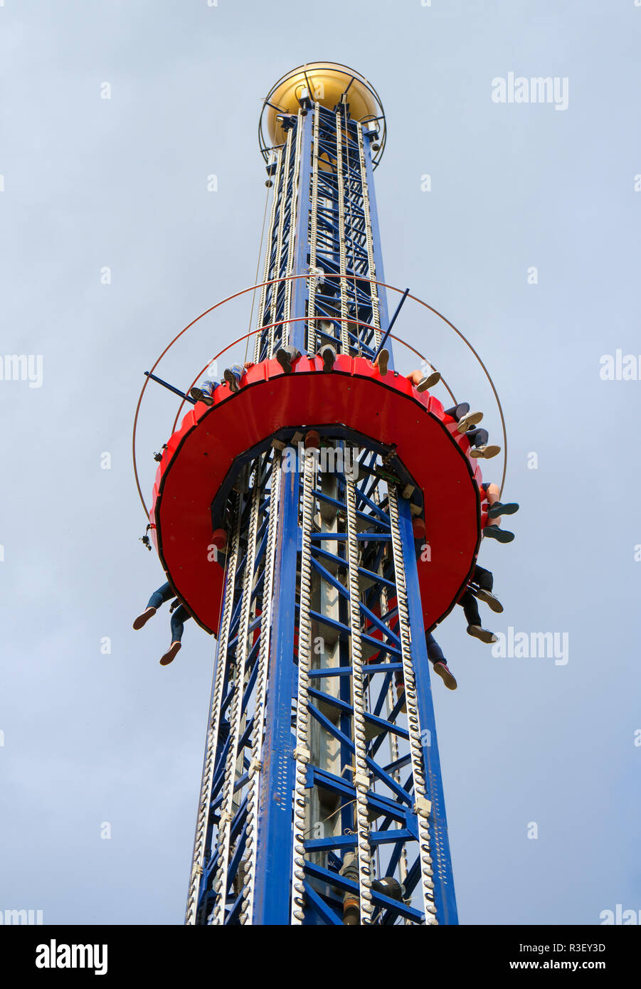 Lifting up machine in amusement park at summer Stock Photo - Alamy