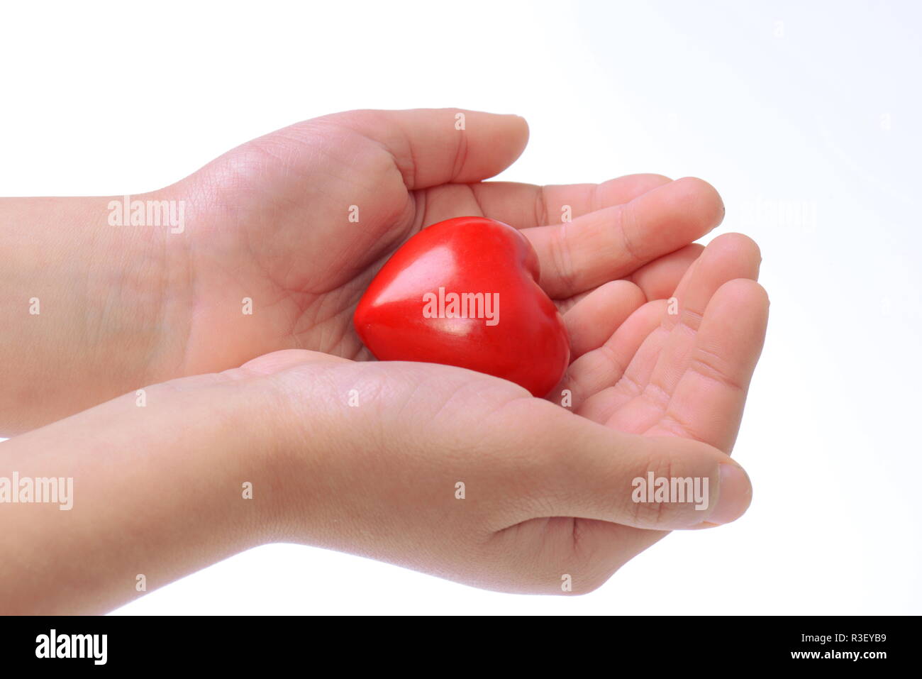 hand with red heart Stock Photo