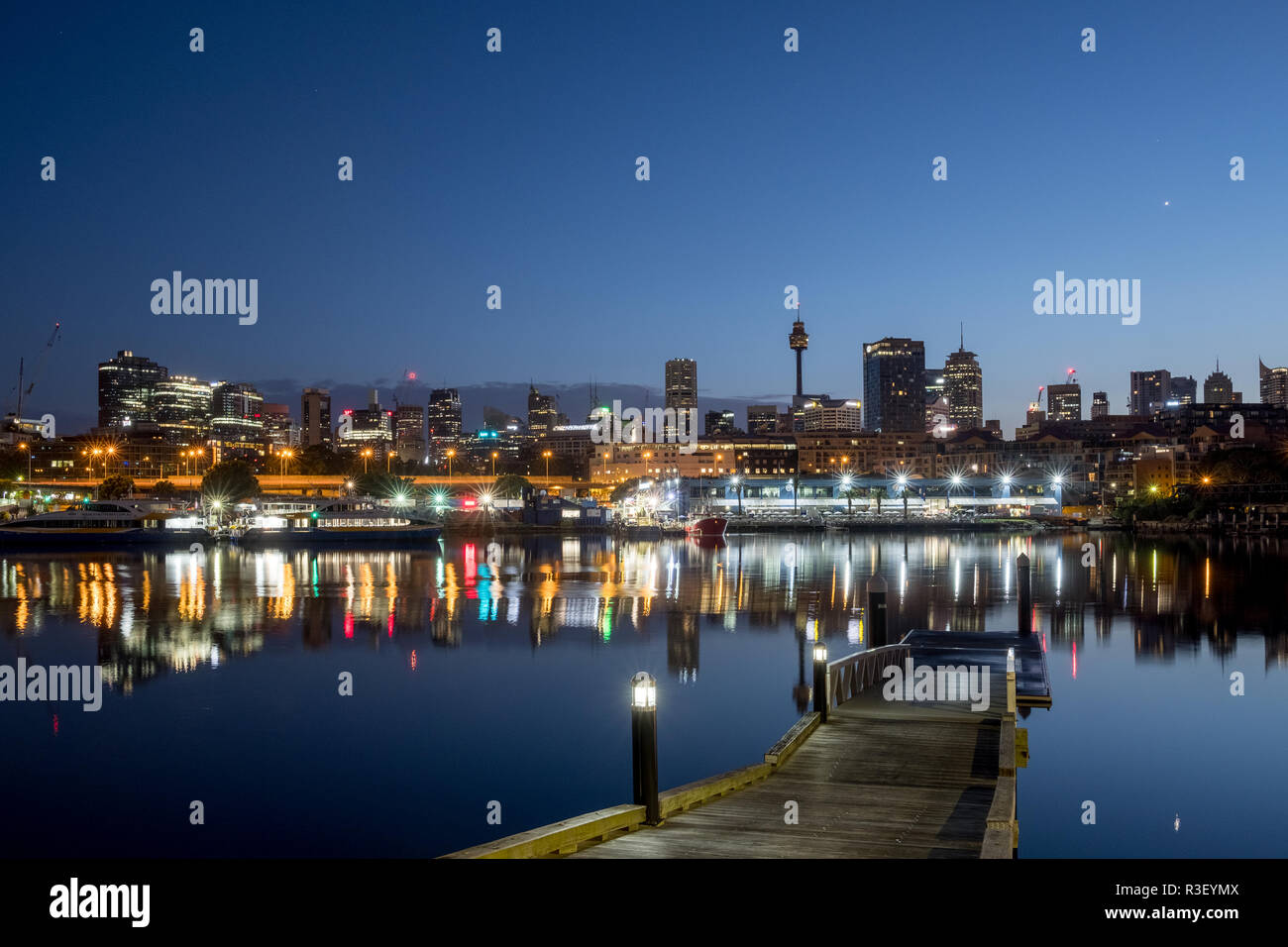 Glebe Rowers Club jetty and Sydney's Blackwattle Bay with Fish Market