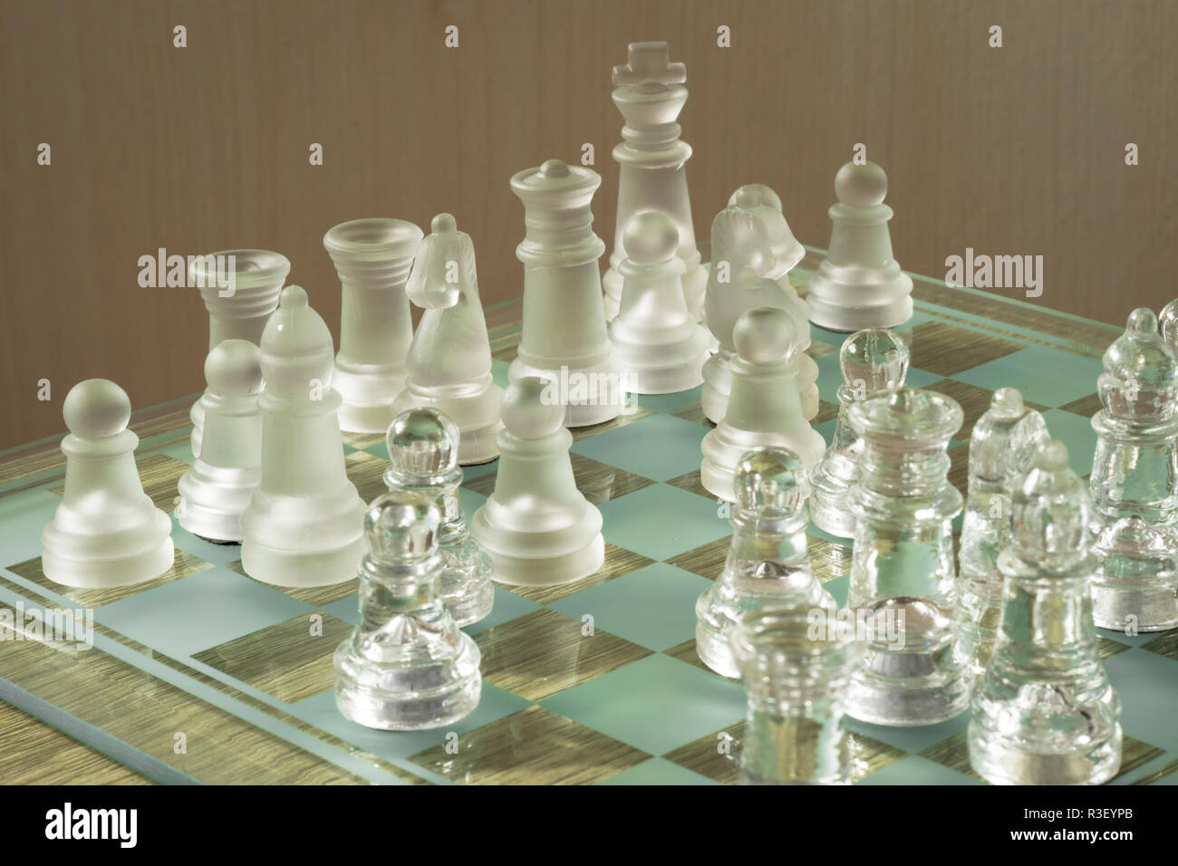 Premium Photo  Chess piece, compass and sand glass on board