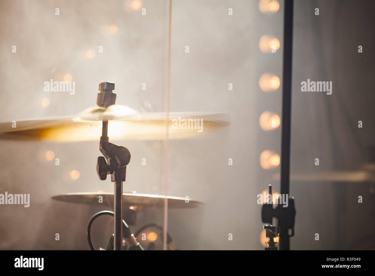 Live rock music photo background, rock drum set  with cymbals in action. Close-up photo, soft selective focus Stock Photo