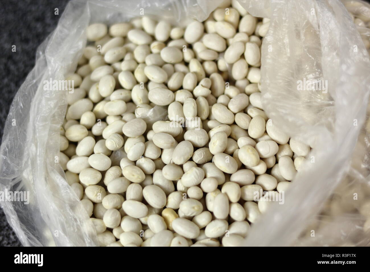 White pea beans in plastic bag Stock Photo Alamy