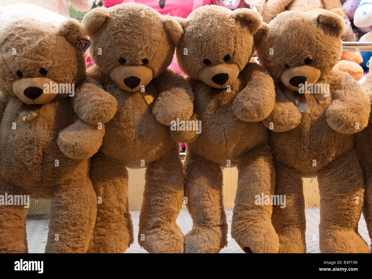 hanging teddy bears, prices of a lottery stall at the funfair autumn