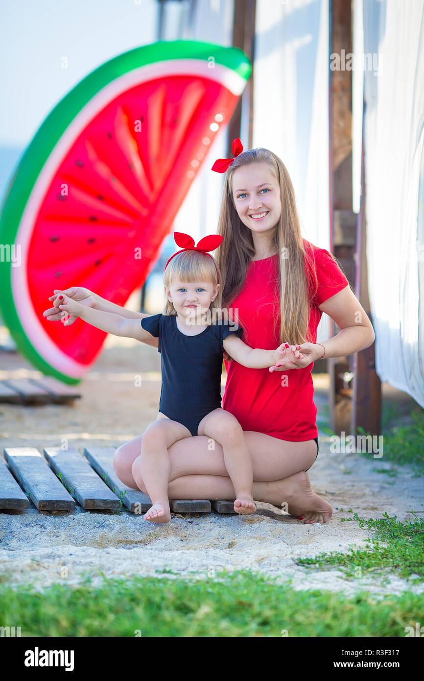 Mother daughter bikini top High Resolution Stock Photography and Images Alamy
