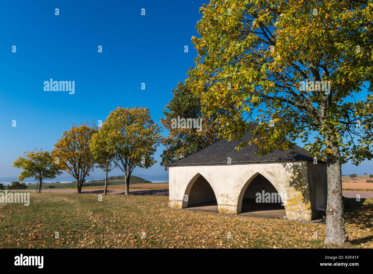 Shelter building and chapel up the hills on a high plateau near Irsch, town of Saarburg, Rhineland-Palatinate, Germany, Stock Photo
