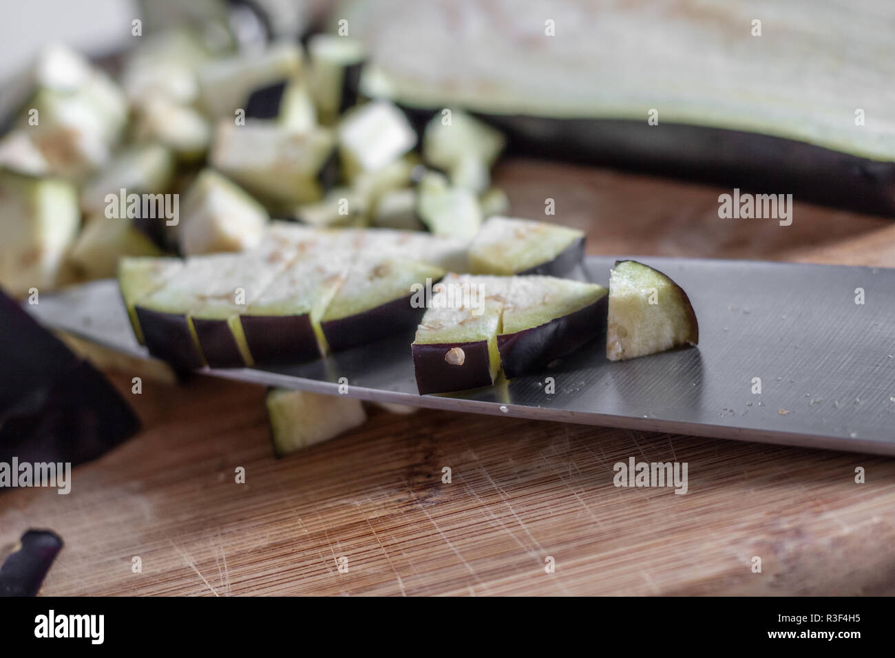Diced Eggplant on knife Stock Photo Alamy