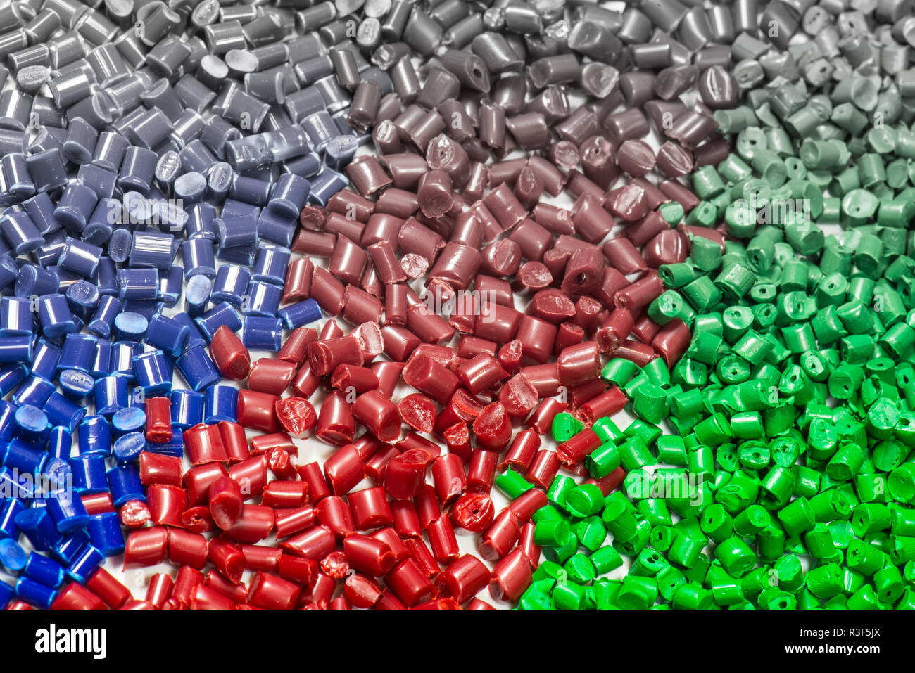 gradient colored plastic granulates Stock Photo - Alamy
