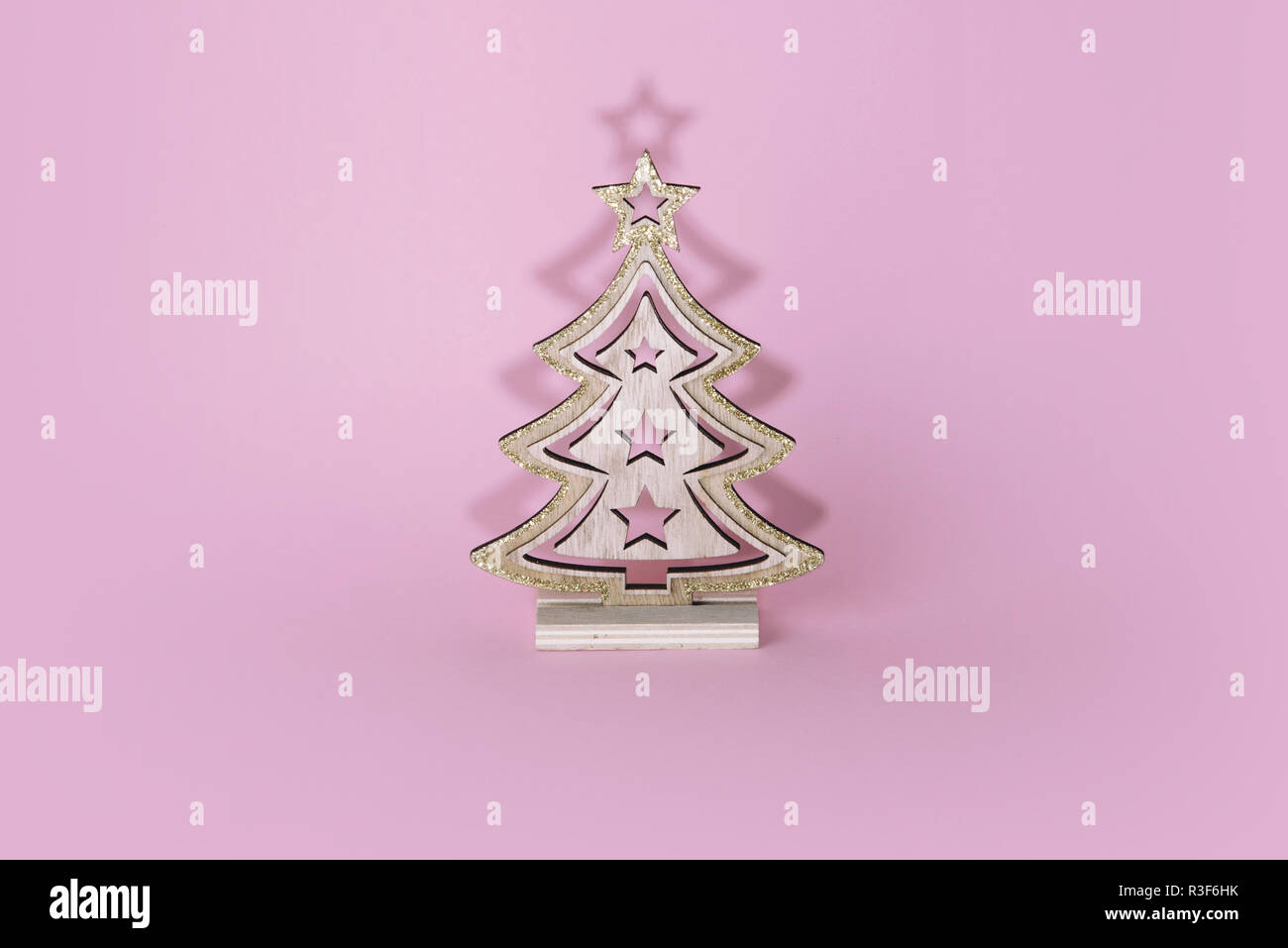 Christmas tree over light blue background Stock Photo - Alamy
