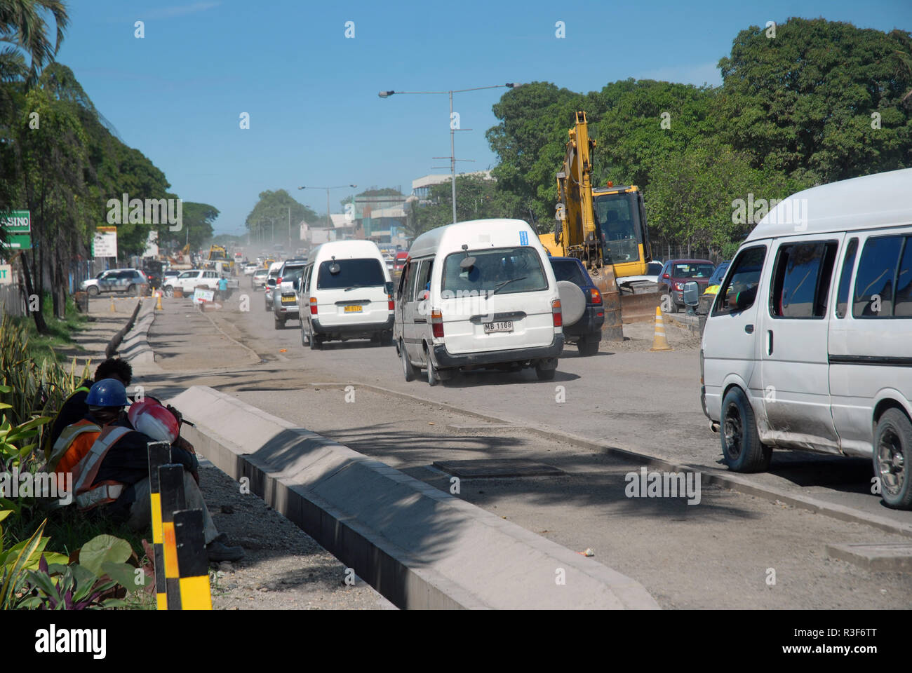Road works and road construction workers on Kukum Highway, Honiara