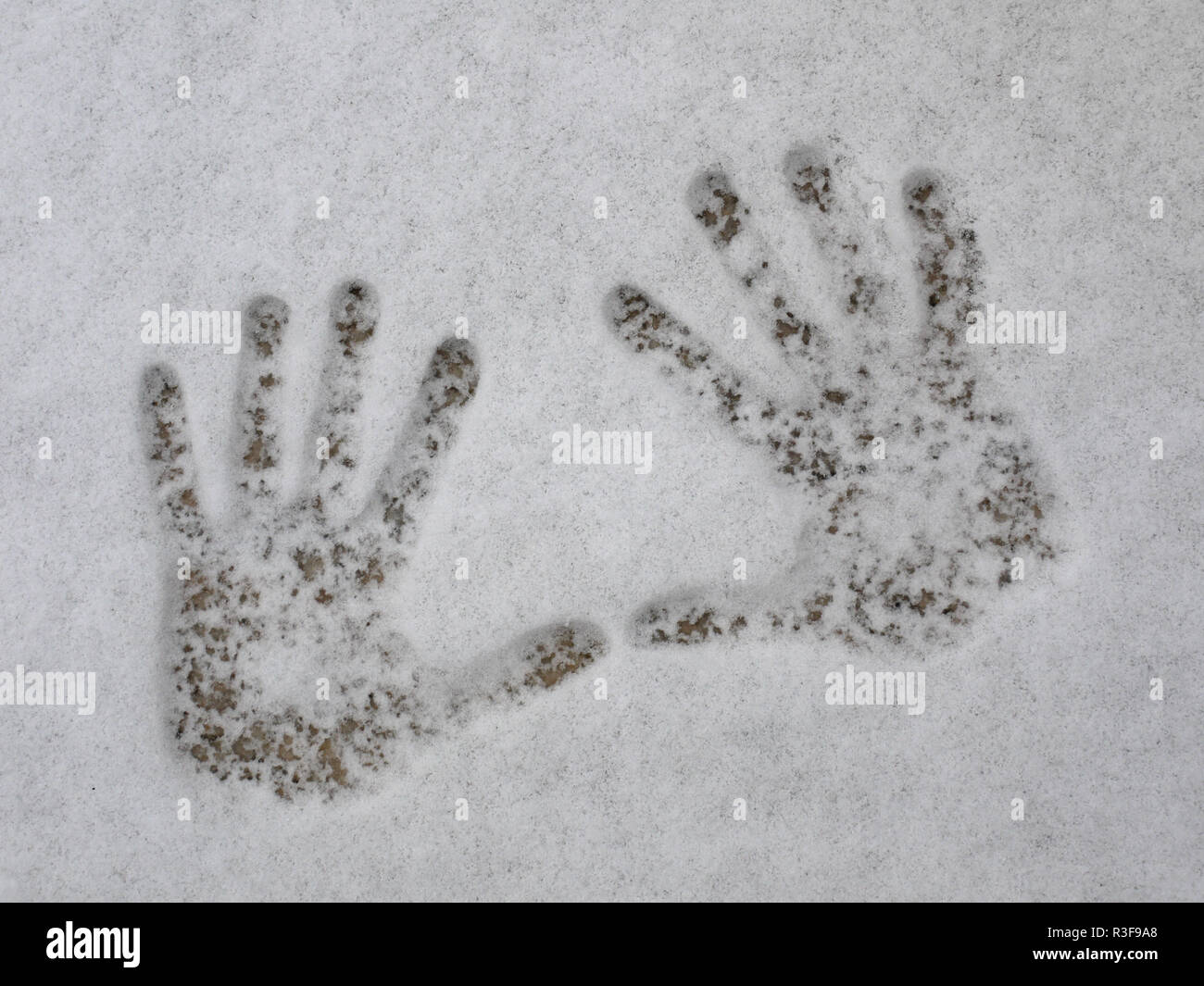 handprint in the snow Stock Photo