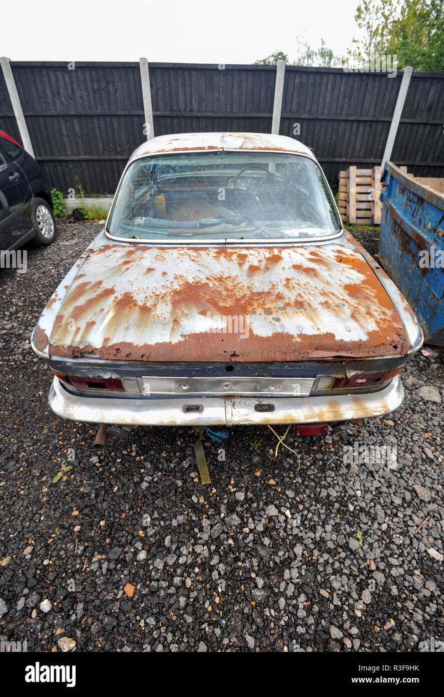 Very rusty wreck classic BMW E9 classic sports car Stock Photo