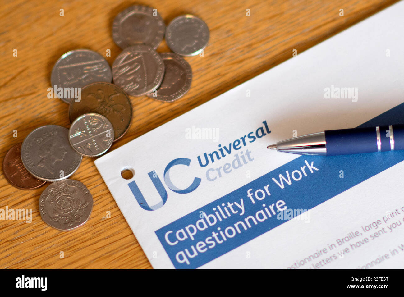 A picture shows a Universal Credit Capability for Work questionnaire form being filled out by a person off work with long term illness. UK. Nov 18. Stock Photo