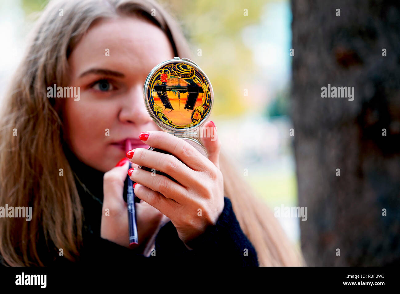 Russian model doing a makeup, Blue eye blonde hair girl Stock Photo