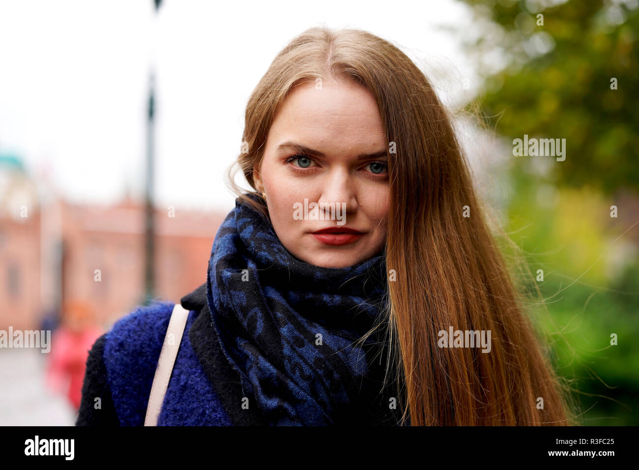 Russian girl shooting for autumn season in Moscow, Blue eye girl with blonde hairs Stock Photo