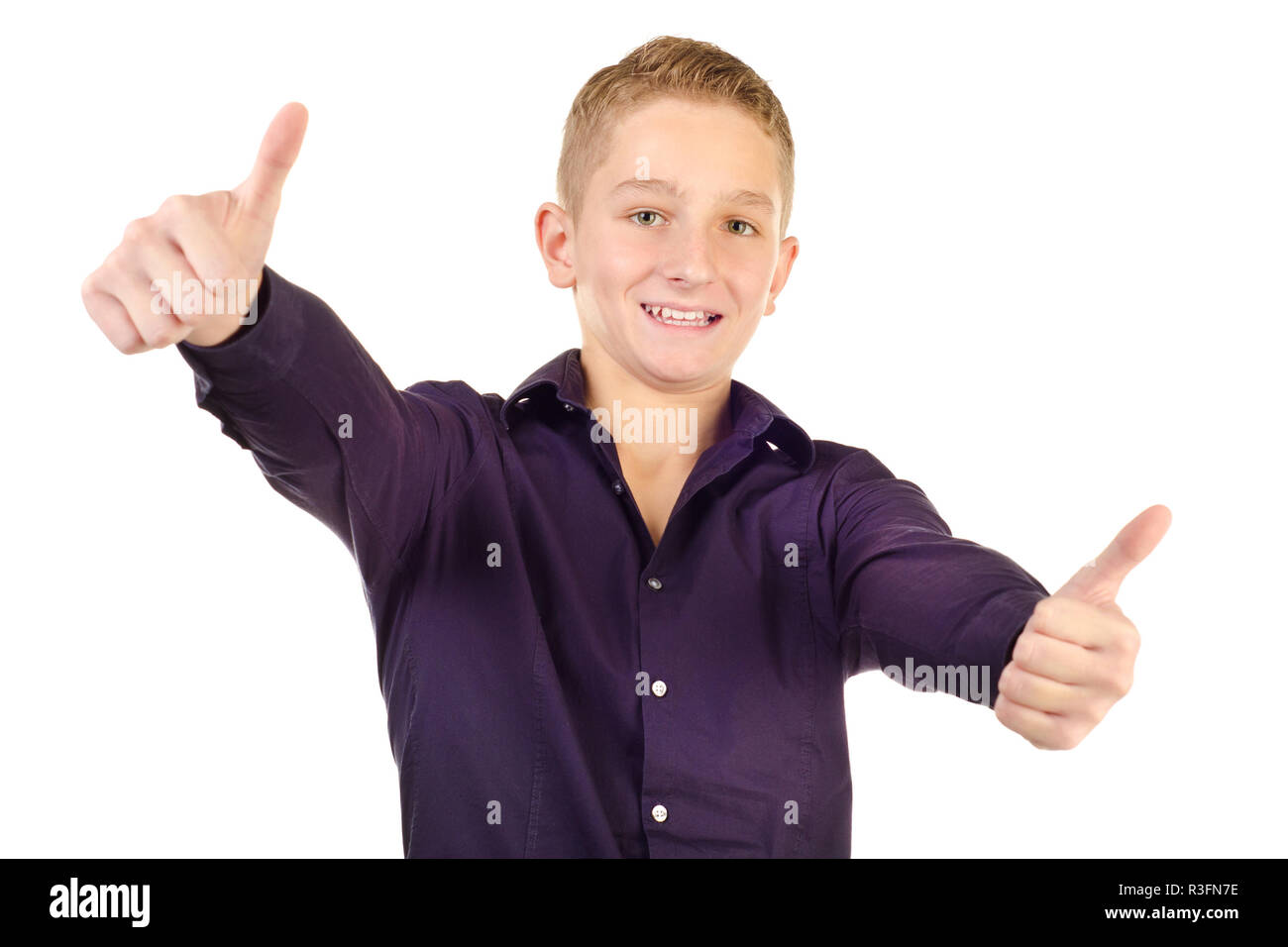 teenage boy giving thumbs up isolated on a white background Stock Photo ...