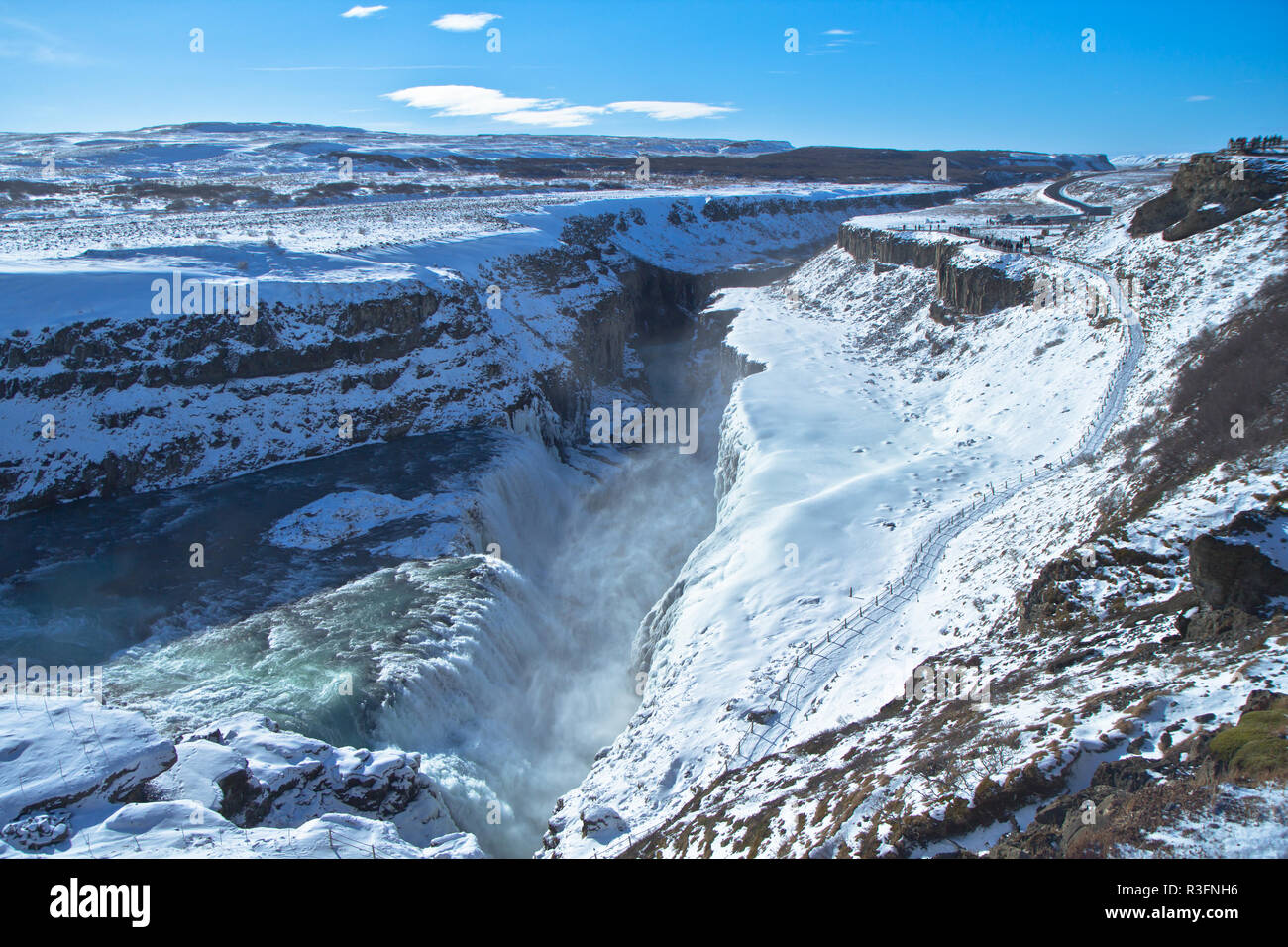 The Golden Circle, Iceland, Gullfoss waterfall and Strokkur which continues to erupt every 5–10 minutes Stock Photo