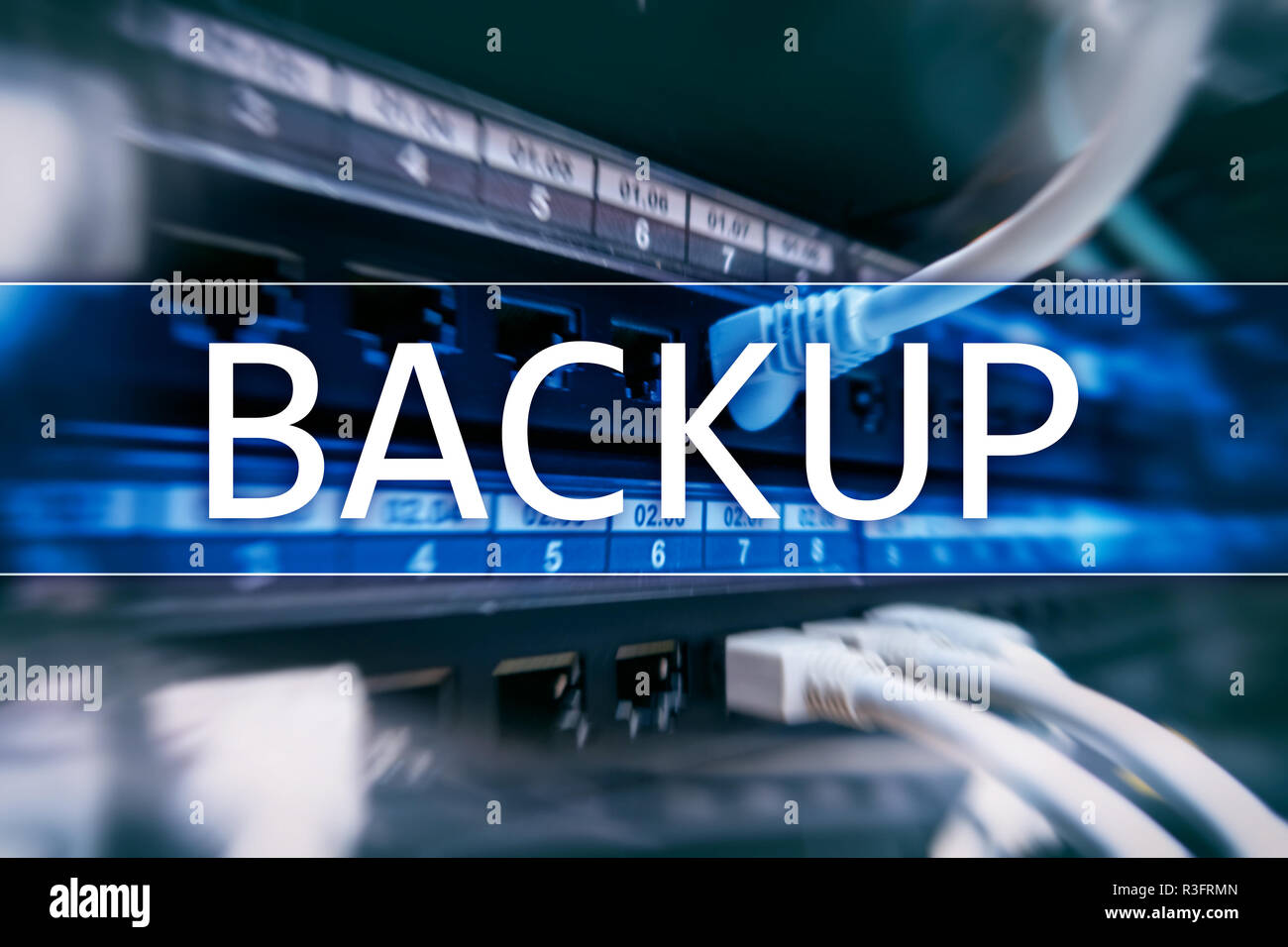 Backup button on modern server room background. Data loss prevention ...
