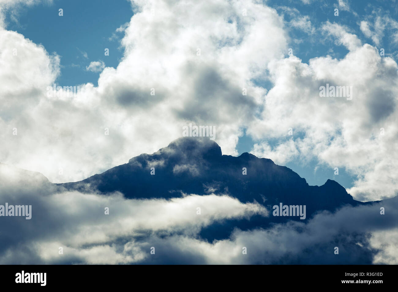Cloud On Ridges Clouds around mountain ridge Stock Photo - Alamy