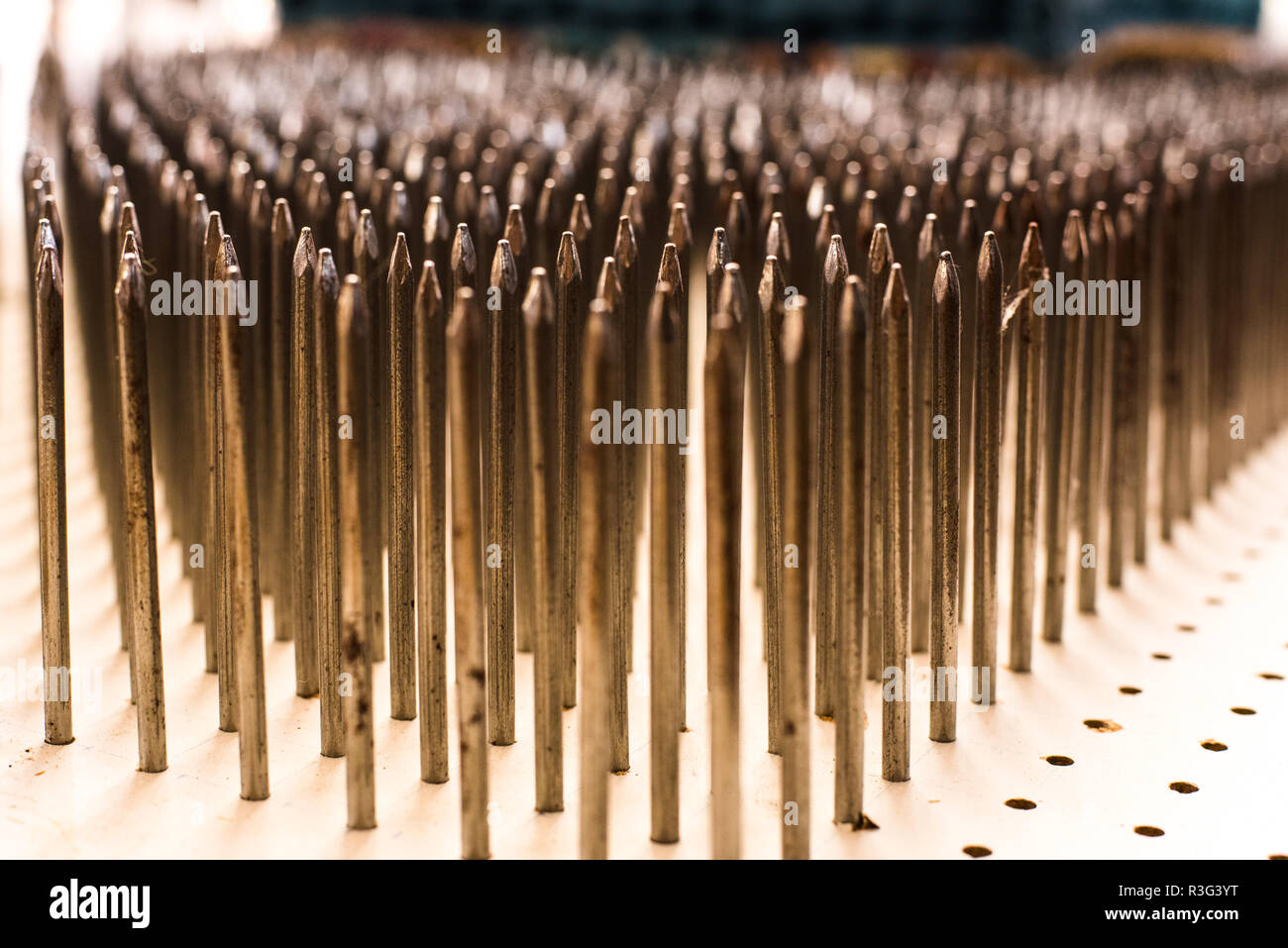 Perspective of nails in fakir bed Stock Photo Alamy