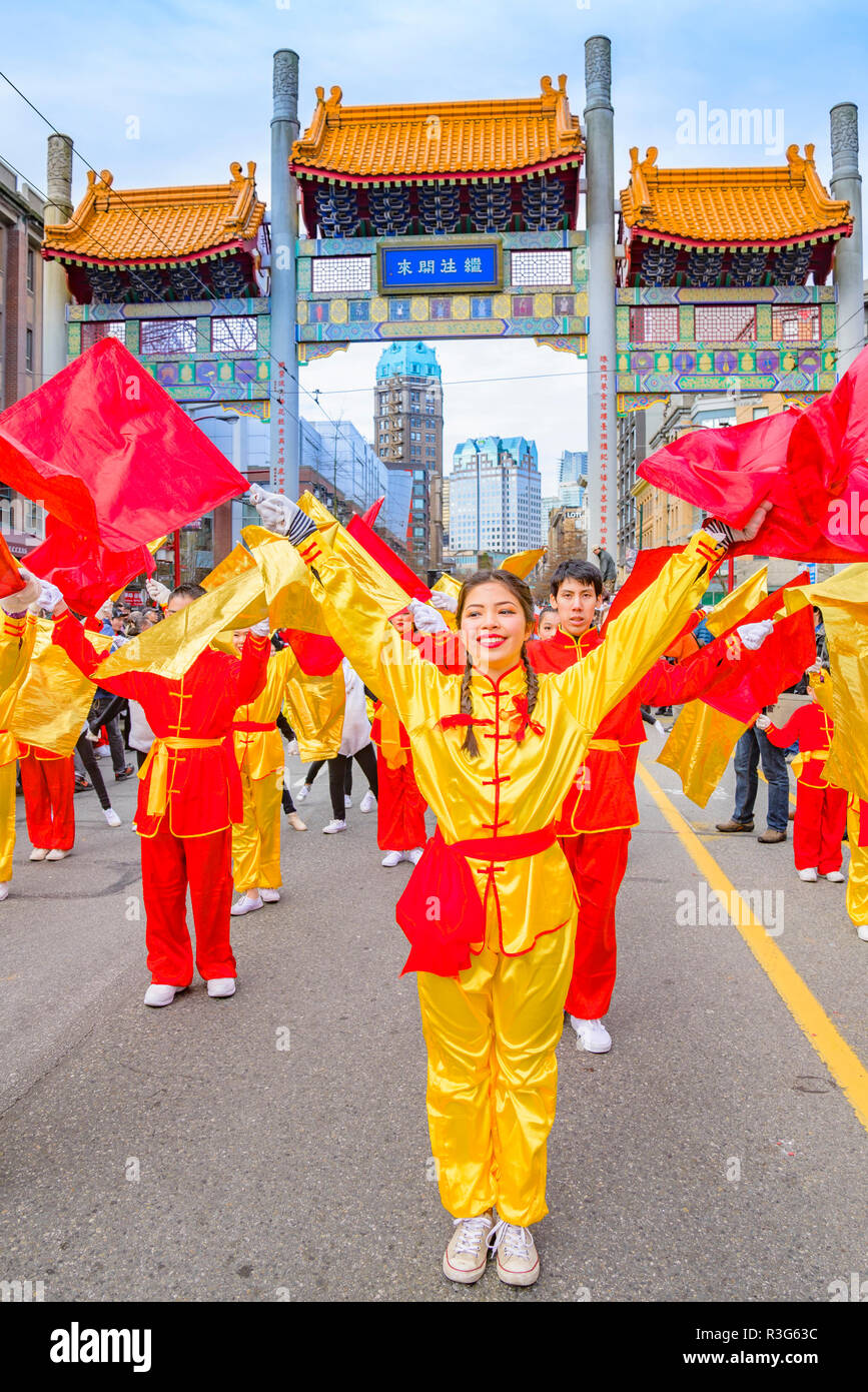 Flag dancers, 2015 Chinese New Year Parade, Vancouver, British Columbia, Canada Stock Photo