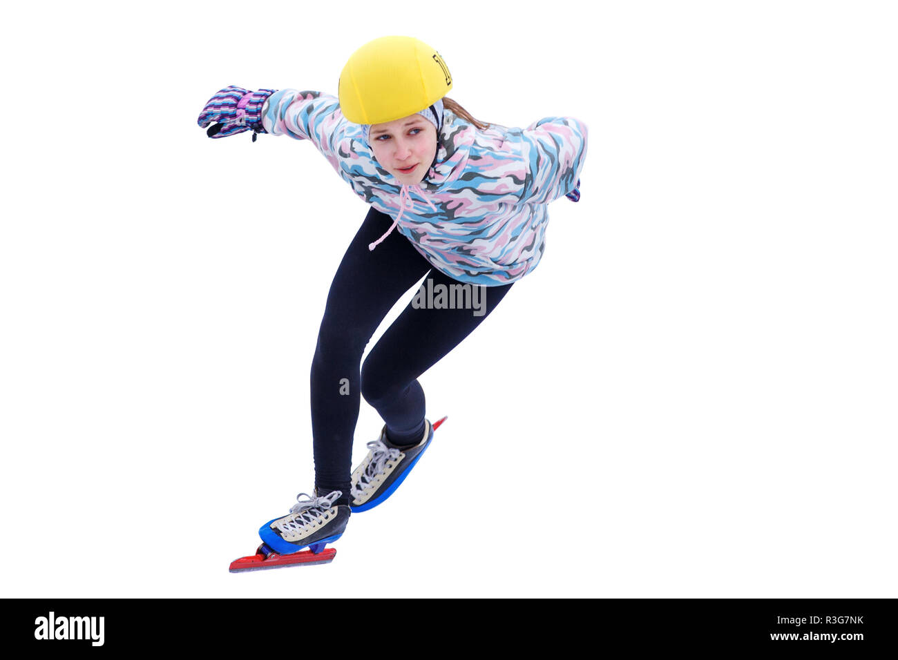 Short track isolated sportswoman. Speed skating young girl on training rink. Stock Photo