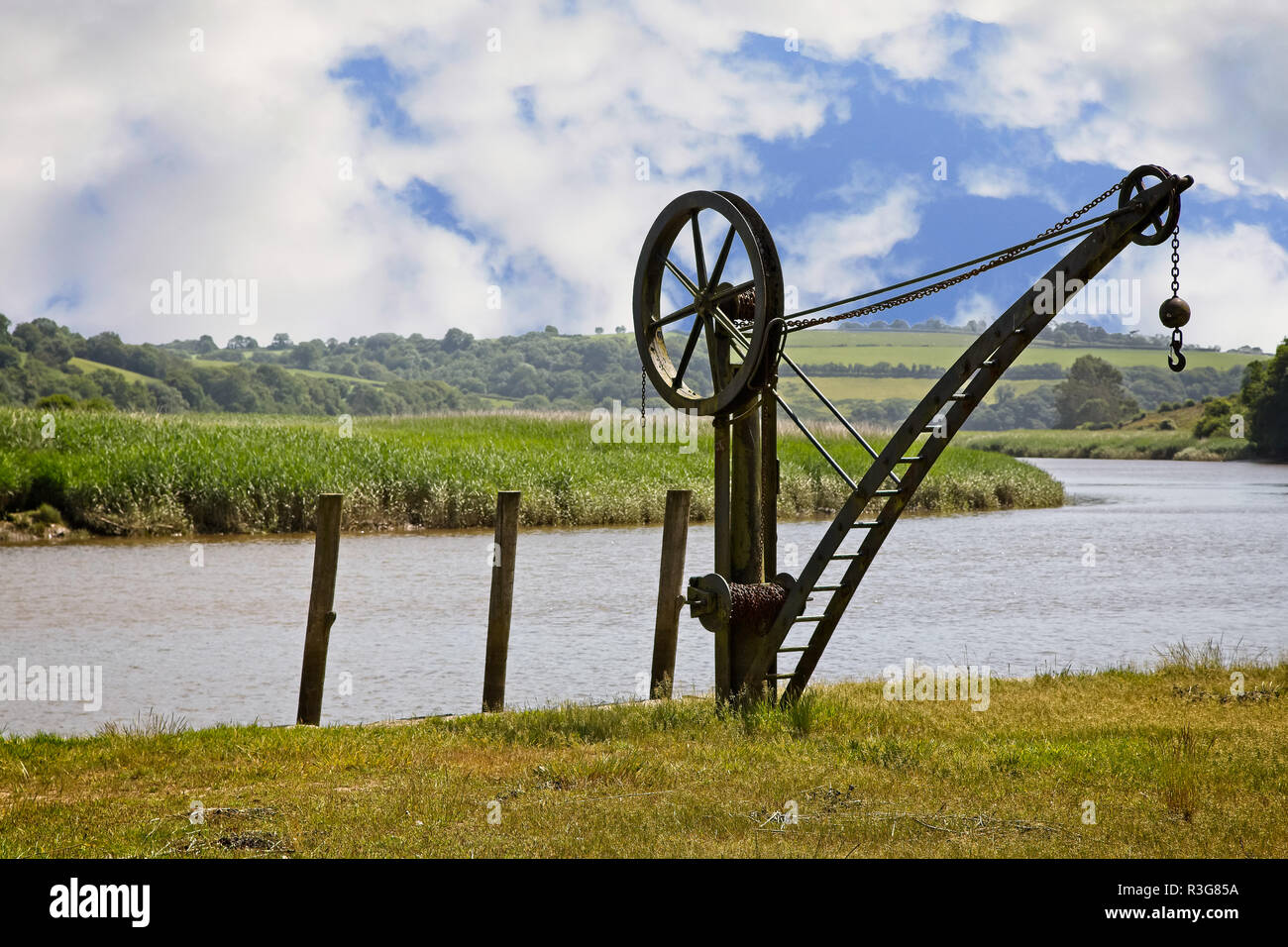 Vintage lifting hoist to lower boats into river Stock Photo Alamy