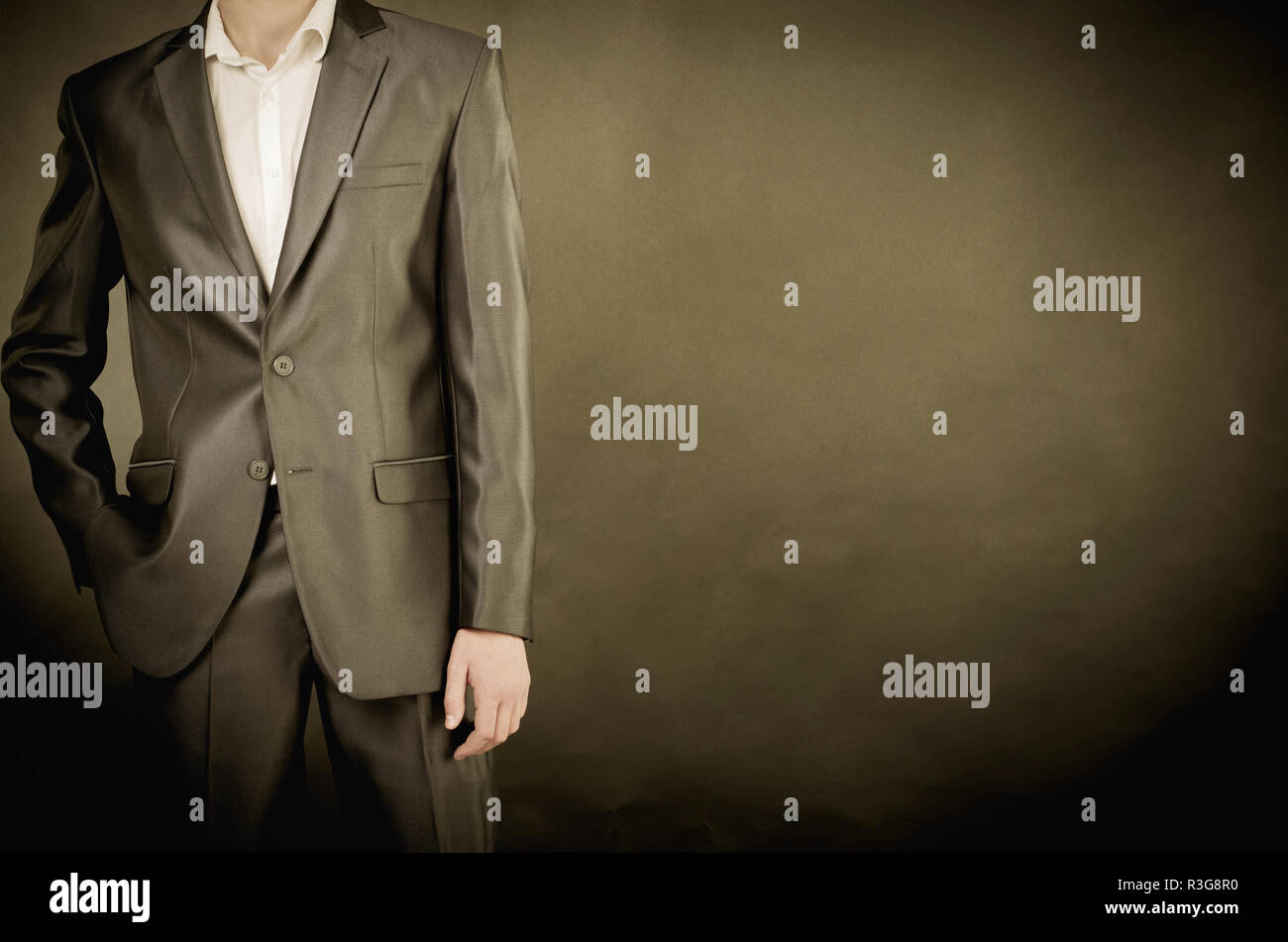 man in suit on a black background Stock Photo - Alamy
