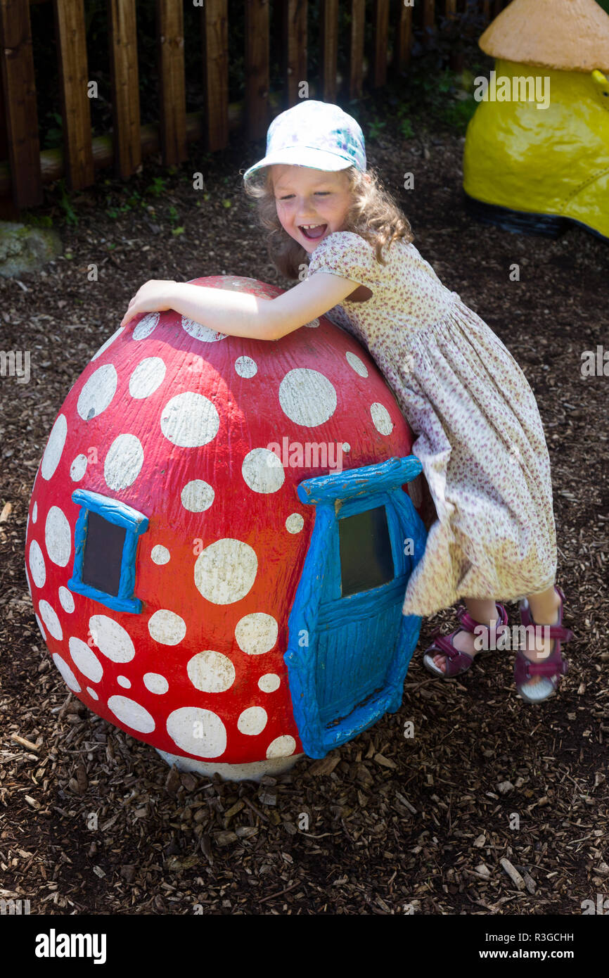 Girl / girls / child / children / kid / kids play in playground area