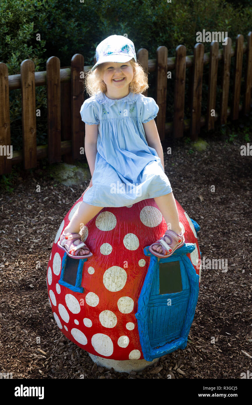Girl / girls / child / children / kid / kids play in playground area