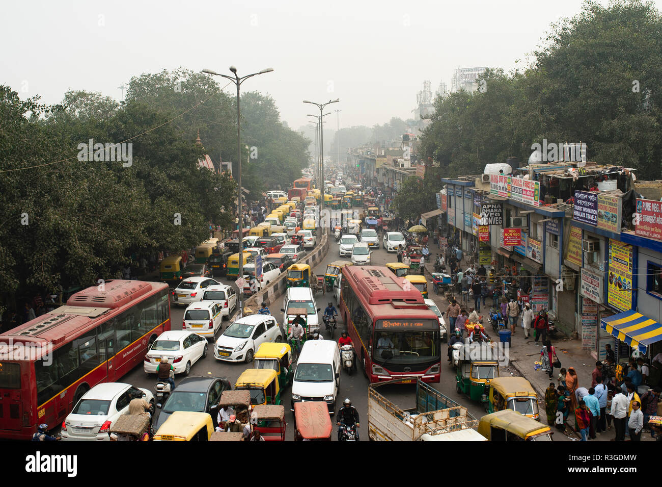 Traffic jam on the polluted streets of New Delhi, India. Stock Photo