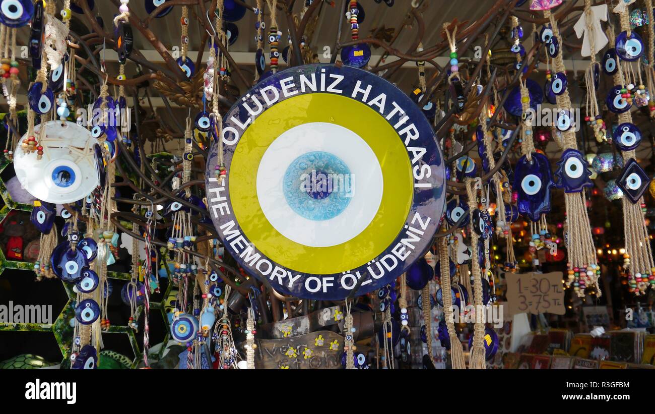 Turkish evil eye pendants, nazar boncuk or good luck charms in Oludeniz, Turkey Stock Photo