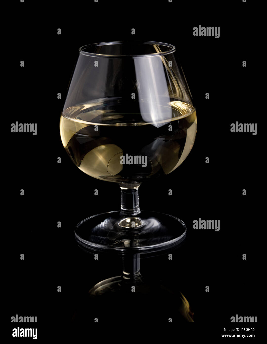 one glass white wine on black background Stock Photo