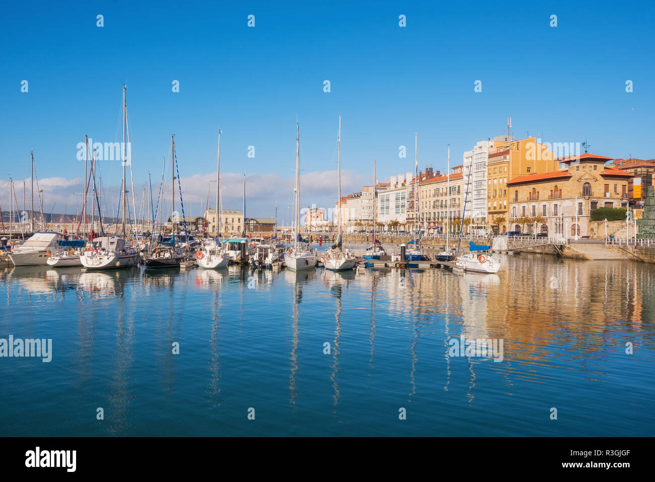 Gijon cityscape. Yatchs in marina port of Gijon, Asturias, Spain. Stock Photo