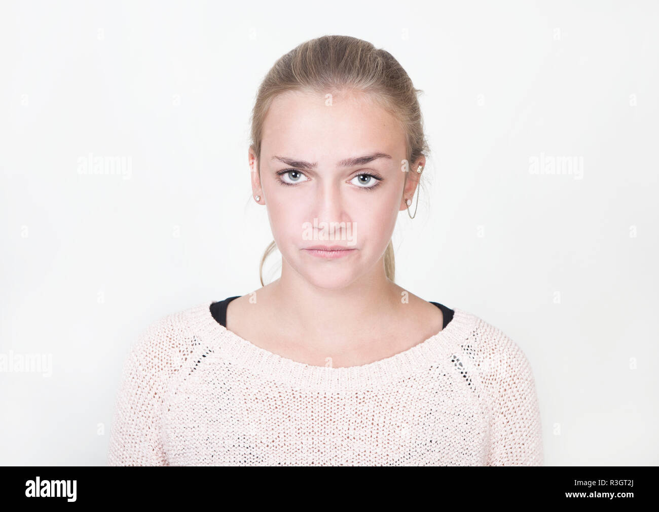 girl looks annoyed portrait Stock Photo