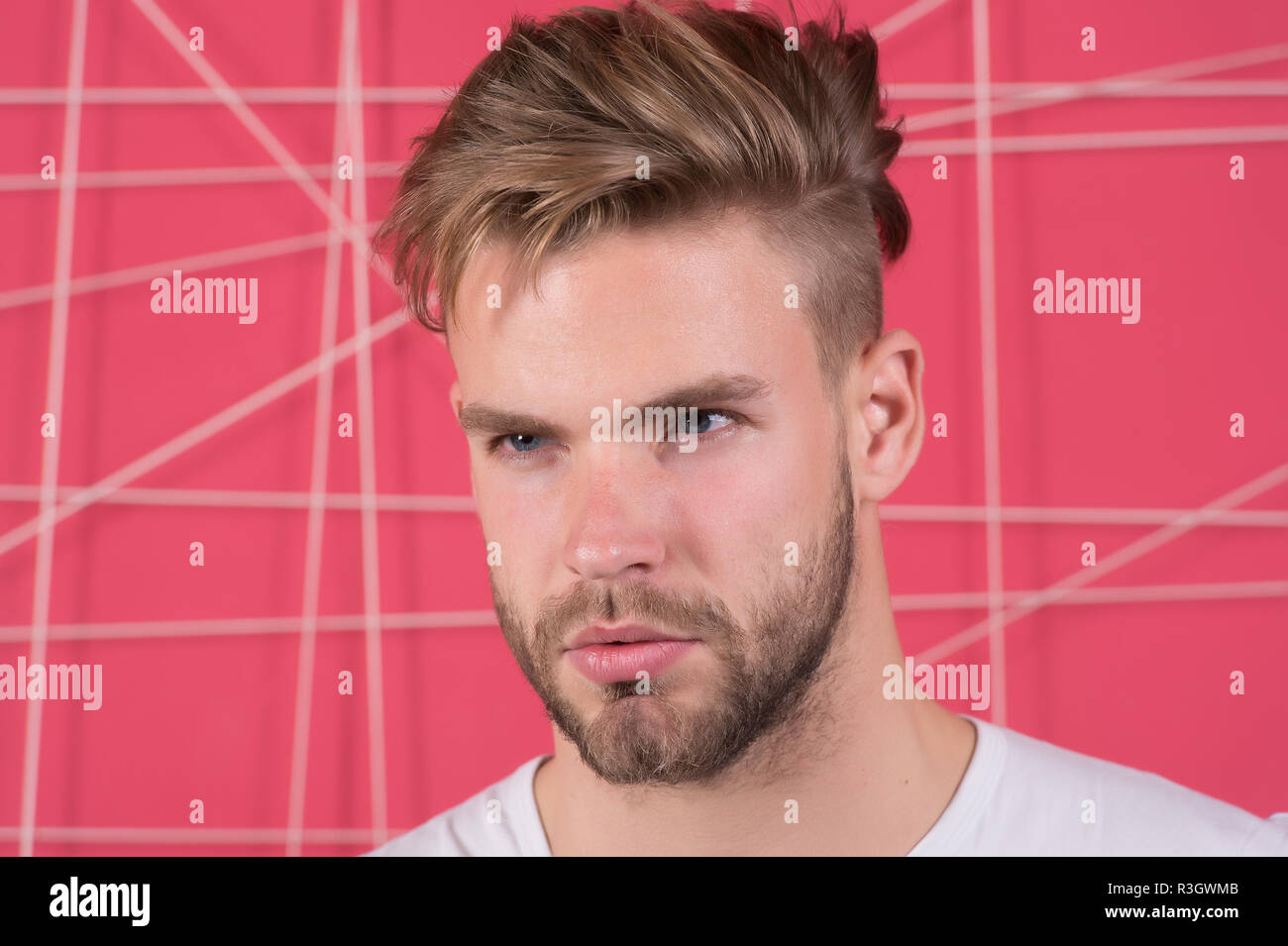 Man With Bristle On Strict Concentrated Face Pink Background