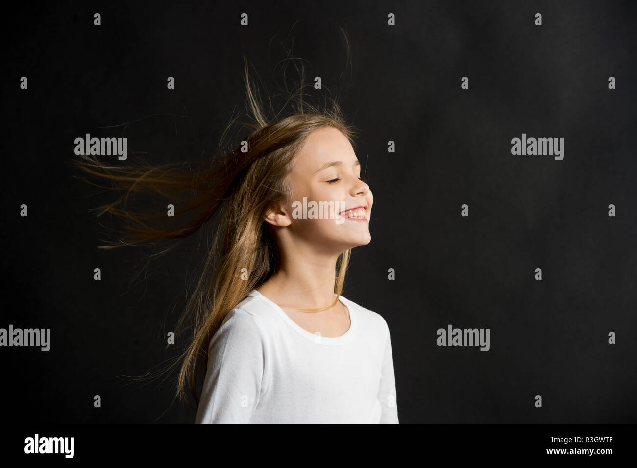 Natural Hair Girl Kid Long Hair Flying In Air Black Background