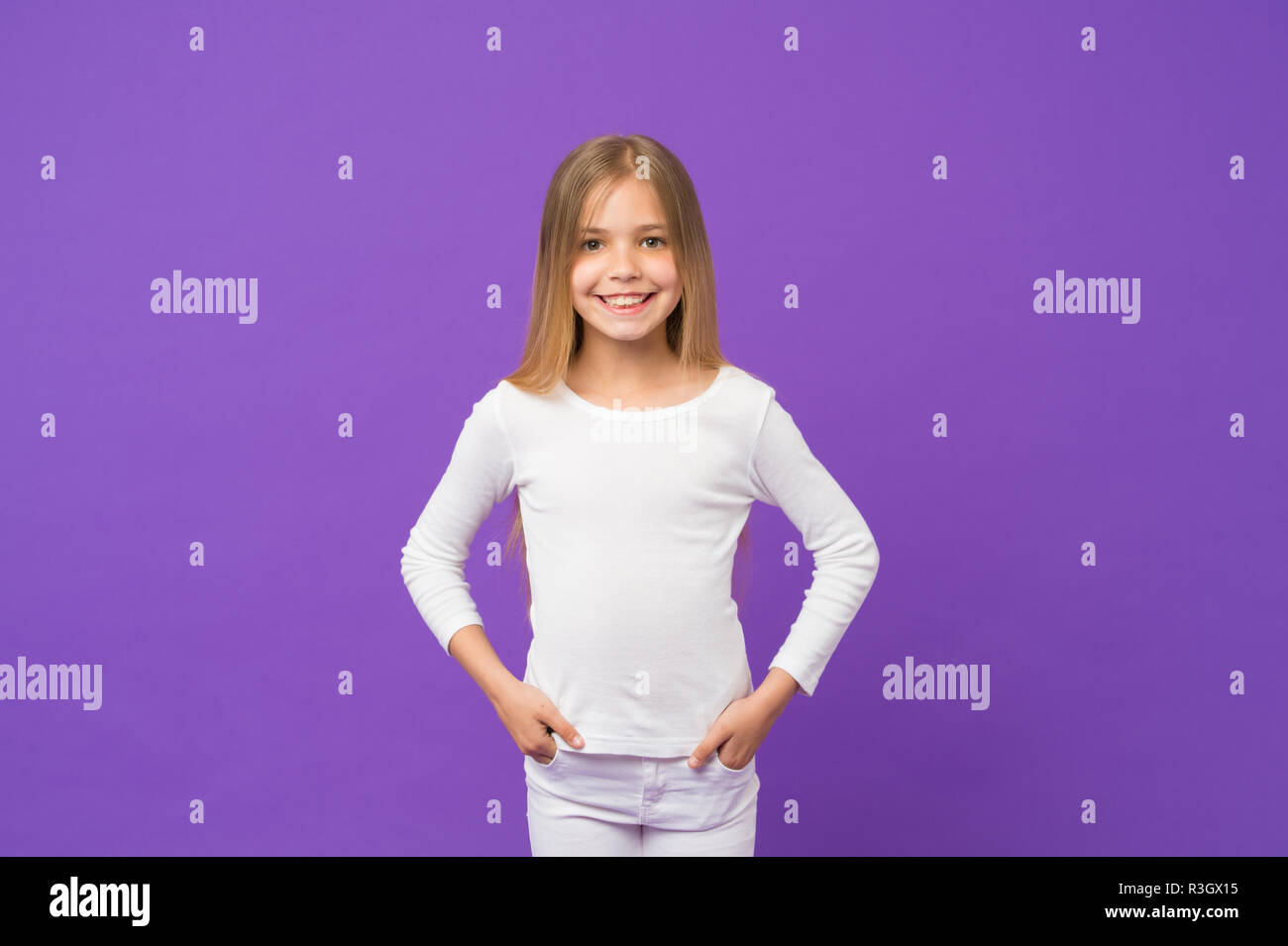 white jumper and jeans