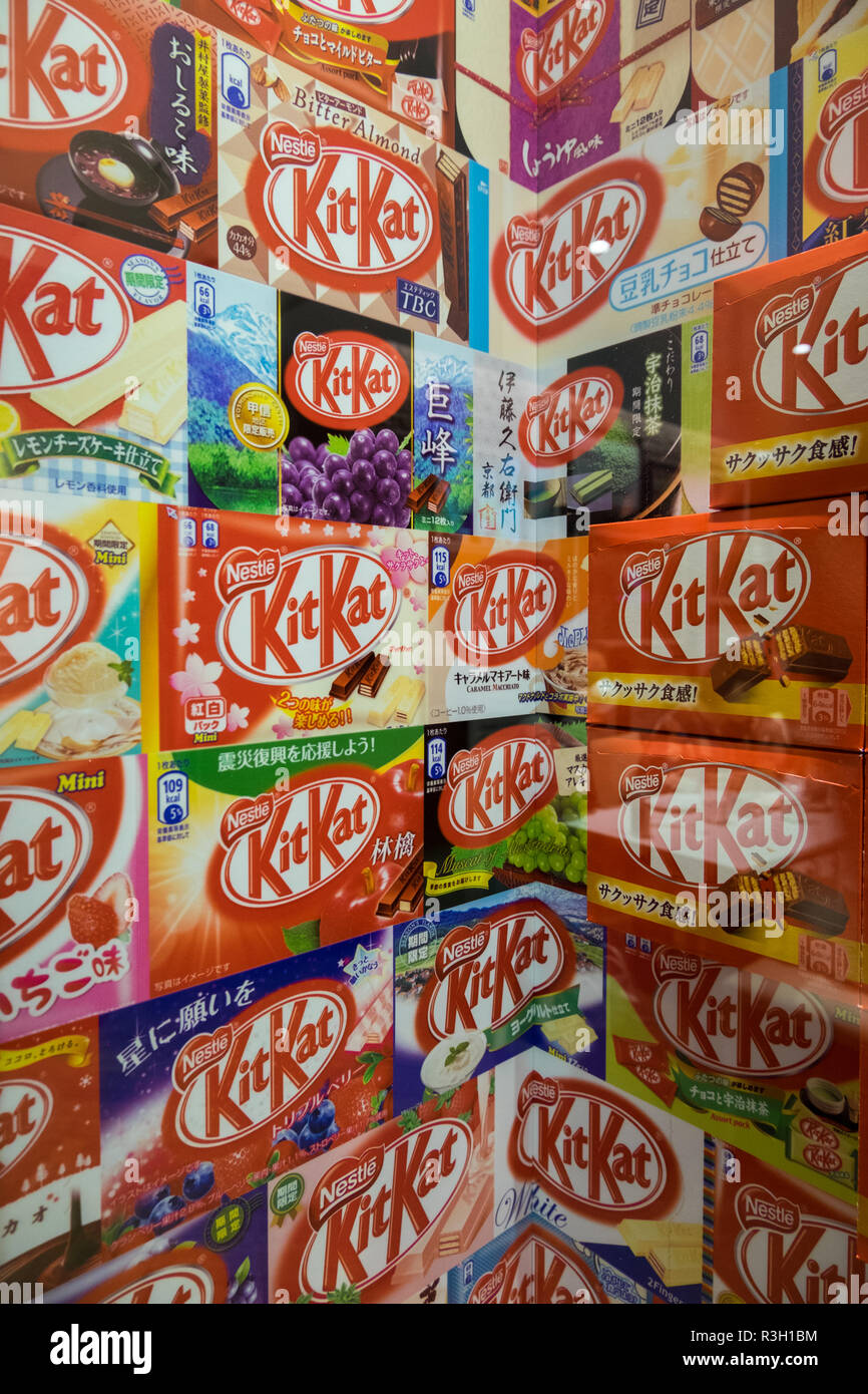 A wall display of various exotic Kit Kat flavors produced over the year in Japan. The display is