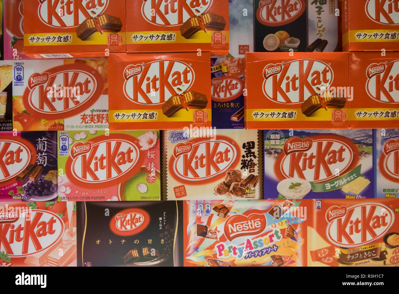 A wall display various exotic Kit Kat flavors produced over the year in Japan. The display is at the Chocolator cafe in Ginza, Tokyo, Japan Stock Photo - Alamy