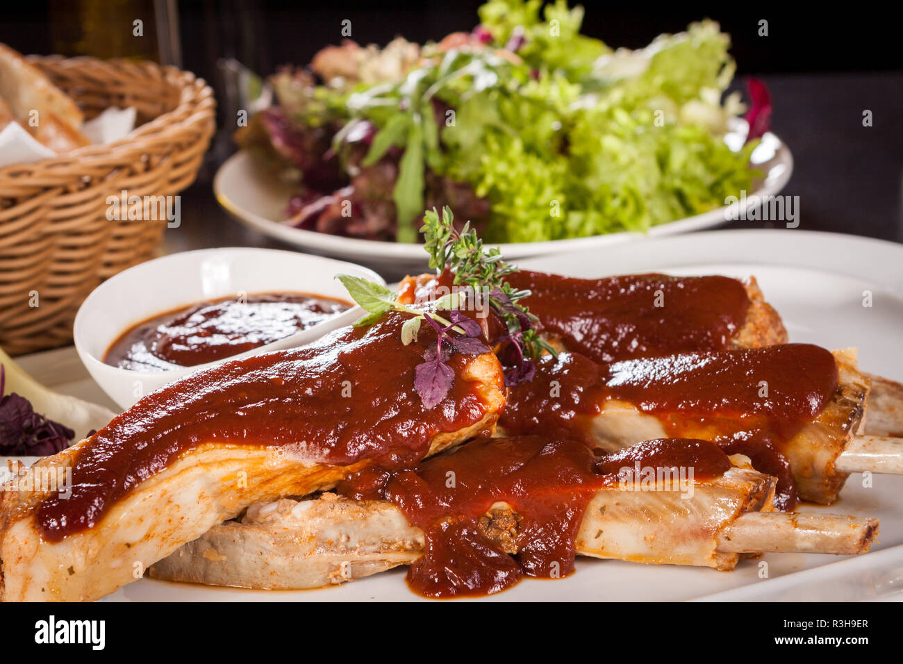 grilled pork ribs spare ribs with barbecue sauce marinade and coleslaw