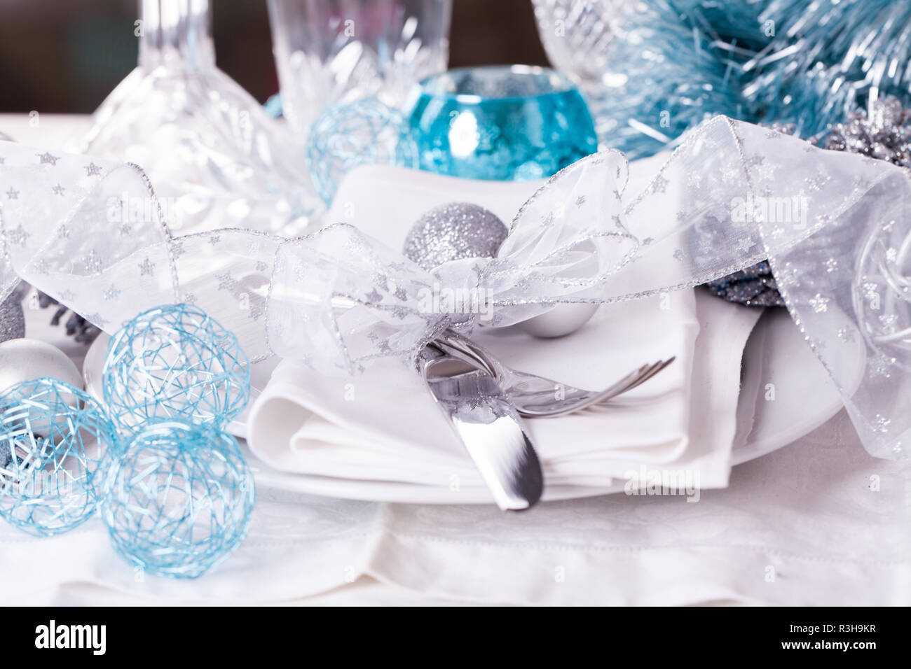 Stylish Table With Christmas Decoration In Turquoise And Silver