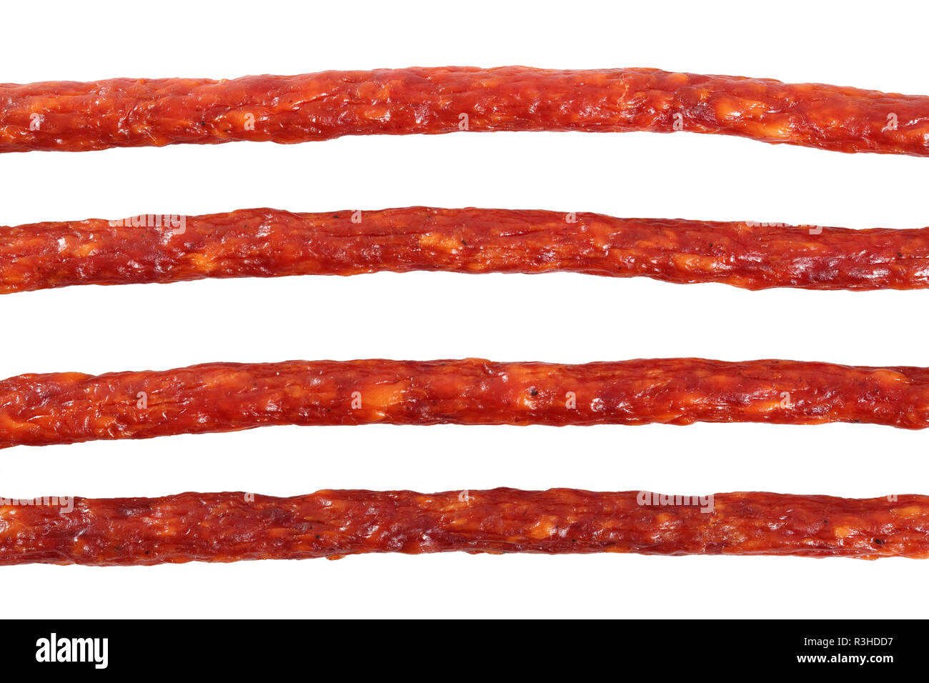 Kabanos. Polish long thin dry sausage made of pork. Isolated on white