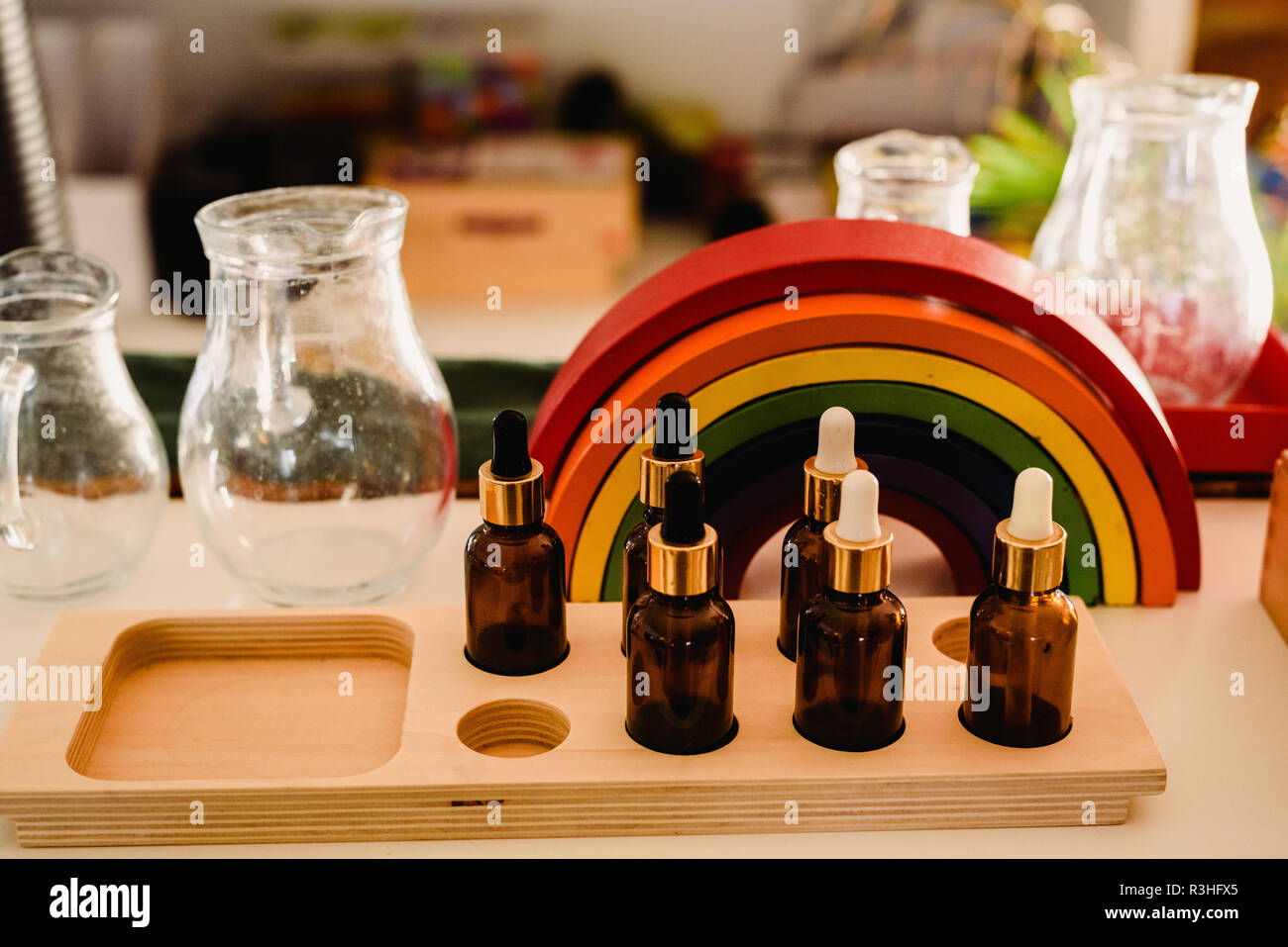 Children playing with wooden rainbow waldorf montessori Stock Photo - Alamy